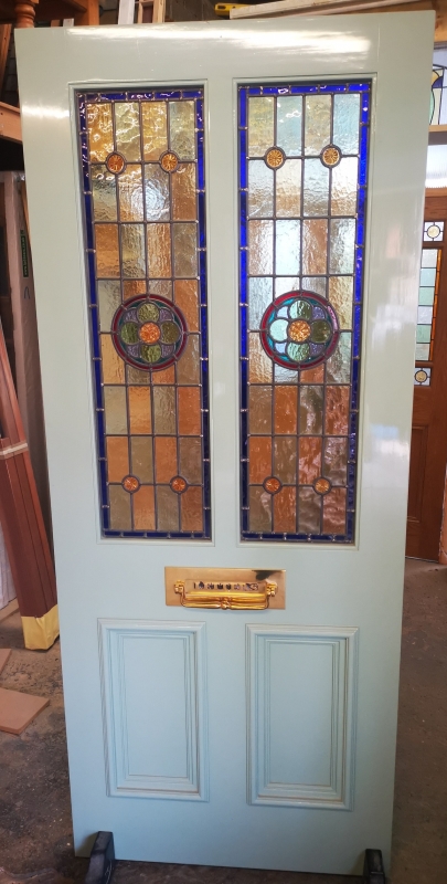 A very pretty Victorian style glazed front door