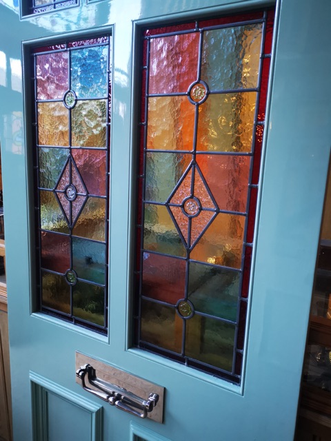 A Victorian Style Stained Glass Front Door Incorporating 3 Over 2 Glazed Panels