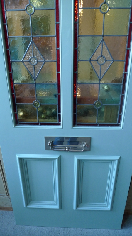 A Victorian Style Stained Glass Front Door Incorporating 3 Over 2 Glazed Panels